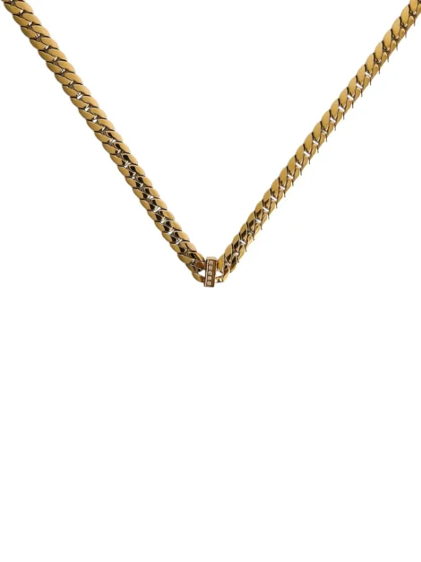 Collier chaîne dorée en acier inoxydable à maille plate avec détail central orné de strass, bijou élégant et moderne pour femme.