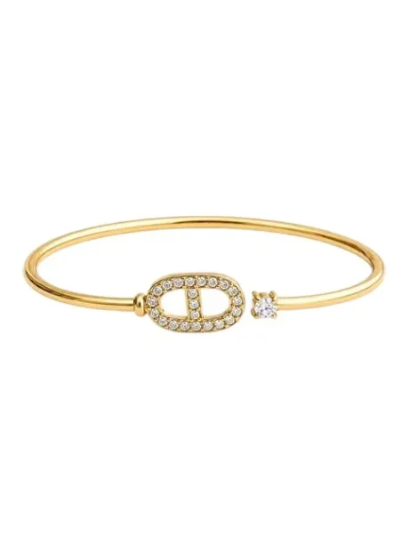 Bracelet jonc doré ouvert avec maillon pavé de zirconiums et pierre solitaire brillante